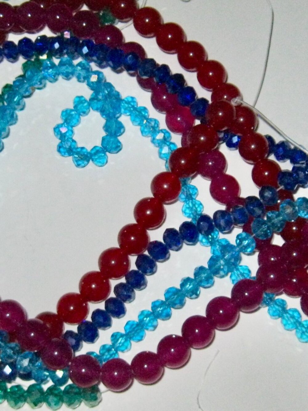 GREAT SELECTION OF FACETED CUT BEADS ON STRING-4 DIFFERENT COLORS-NEW